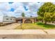 Charming single-story home with a covered carport and inviting curb appeal at 4438 W Hatcher Rd, Glendale, AZ 85302