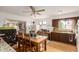 Eat-in kitchen featuring wood cabinets, natural light, and ample counter space at 4438 W Hatcher Rd, Glendale, AZ 85302
