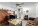 Inviting living room with ceiling fan and comfortable seating at 4438 W Hatcher Rd, Glendale, AZ 85302