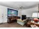 Cozy living room with comfortable seating and a TV at 4438 W Hatcher Rd, Glendale, AZ 85302