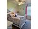 Bright bedroom featuring a bed with whimsical bedding, polka dot design, and charming decor at 491 E Jeanne Ln, San Tan Valley, AZ 85140