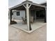 Cozy back patio featuring an outdoor dining set, gazebo, and string lights for a relaxing outdoor space at 5303 W Port Au Prince Ln, Glendale, AZ 85306