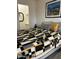 Bedroom features a large bed and an entrance to a walk-in closet at 5303 W Port Au Prince Ln, Glendale, AZ 85306