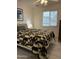 Bedroom with a ceiling fan and a window at 5303 W Port Au Prince Ln, Glendale, AZ 85306