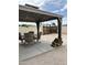 Outdoor patio with gazebo, seating area, and a view of the backyard at 5303 W Port Au Prince Ln, Glendale, AZ 85306