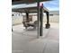 Backyard with a covered patio area including a gazebo and outdoor seating at 5303 W Port Au Prince Ln, Glendale, AZ 85306