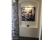 Close up of Marilyn Monroe pop art over a decorative niche with stone accent wall at 5402 E Cortez Dr, Scottsdale, AZ 85254