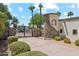 Elegant wrought-iron gate and stone perimeter wall at 5402 E Cortez Dr, Scottsdale, AZ 85254