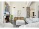 Bright living room with stylish decor, a cozy fireplace, and stone details offering a sophisticated and relaxing atmosphere at 5402 E Cortez Dr, Scottsdale, AZ 85254