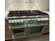 Close-up of a dual oven gas range, with digital settings, and stainless steel finish at 5402 E Cortez Dr, Scottsdale, AZ 85254