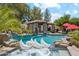 Inviting backyard pool with rock waterfall, spa and poolside gazebo at 5402 E Cortez Dr, Scottsdale, AZ 85254