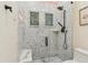 Tiled shower with dual showerheads and windows for natural light at 5402 E Cortez Dr, Scottsdale, AZ 85254