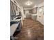 Functional kitchen featuring modern appliances, updated countertops, and stylish cabinetry at 5517 E Boise St, Mesa, AZ 85205