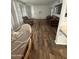 Comfortable living room featuring stylish furnishings, wood-look floors, and plenty of space at 5517 E Boise St, Mesa, AZ 85205