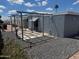 Private backyard with desert landscaping and patio area at 5735 E Mcdowell Rd # 63, Mesa, AZ 85215