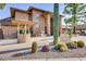 Well maintained exterior of brick building, featuring a covered entrance with desert landscaping at 5735 E Mcdowell Rd # 63, Mesa, AZ 85215