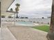 Desert backyard featuring a kidney shaped pool, covered patio, and minimalist privacy landscaping at 6401 E Eugie Ter, Scottsdale, AZ 85254