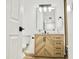Charming bathroom with wood vanity, marble countertop, modern fixtures, and stylish lighting at 6401 E Eugie Ter, Scottsdale, AZ 85254