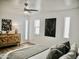 Bedroom features modern decor and two narrow windows for ample light at 6401 E Eugie Ter, Scottsdale, AZ 85254