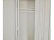 Open closet featuring white folding doors, a shelf, and hanging space at 6401 E Eugie Ter, Scottsdale, AZ 85254
