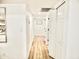 Long hallway with wood-look flooring and ample closet space provides practical functionality and style at 6401 E Eugie Ter, Scottsdale, AZ 85254