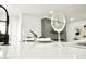 Bright, inviting kitchen island showcasing quartz countertops and stylish barware for elegant entertaining at 6401 E Eugie Ter, Scottsdale, AZ 85254
