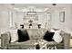 Comfortable living space featuring a plush sofa, open concept design, and modern decor at 6401 E Eugie Ter, Scottsdale, AZ 85254