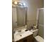 Modest bathroom with framed square mirror and essential toiletries, designed for practical use and personal care at 8307 W Indianola Ave, Phoenix, AZ 85037