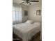 Bright bedroom with neutral tones, offering a clean and comfortable space for relaxation at 8307 W Indianola Ave, Phoenix, AZ 85037