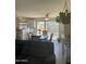 This eat-in kitchen and dining area has sliding glass doors and tile floors at 8307 W Indianola Ave, Phoenix, AZ 85037
