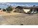 A single-story home featuring a low-maintenance xeriscaped front yard and a two car garage at 8307 W Indianola Ave, Phoenix, AZ 85037