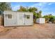 View of a shed on the property with a secured door and small awning at 853 S Evangeline Ave, Mesa, AZ 85208