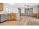 Cozy living area featuring modern flooring, ample natural light, and a ceiling fan for comfortable living at 853 S Evangeline Ave, Mesa, AZ 85208