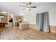 Open-concept living space with modern flooring, a well-equipped kitchen, and a bright, airy atmosphere at 853 S Evangeline Ave, Mesa, AZ 85208