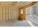 Inside view of a small shed with wooden framing and bare concrete floors at 853 S Evangeline Ave, Mesa, AZ 85208
