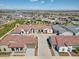 Aerial view of a desert neighborhood with terracotta roofs, desert landscaping, and plenty of sunshine at 11249 N Blakely St, Surprise, AZ 85388