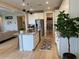 Bright kitchen features white cabinets, granite countertops, stainless steel appliances and a walk-in pantry at 11403 W Ashby Dr, Peoria, AZ 85383