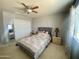 Charming bedroom with soft colors, natural light, and a ceiling fan at 11906 N 154Th N Ln, Surprise, AZ 85379