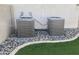 Two York air conditioning units sitting on rocks beside a patch of artificial turf at 11906 N 154Th N Ln, Surprise, AZ 85379