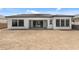 New home with covered patio and desert landscaping, awaiting your personal touch to bloom at 12332 W Parkway Ln, Avondale, AZ 85323