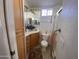 Bright bathroom with vanity, sink, mirrored cabinets and accessible shower at 1318 W Chesapeake Dr, Apache Junction, AZ 85119