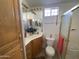 Bathroom with toilet, vanity, and shower at 1318 W Chesapeake Dr, Apache Junction, AZ 85119
