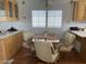 Dining area with wood table and chairs at 1318 W Chesapeake Dr, Apache Junction, AZ 85119