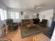 Bright living room with comfortable seating and hardwood floors at 1318 W Chesapeake Dr, Apache Junction, AZ 85119