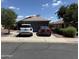 Charming single-story home with a well-maintained front yard and a two-car driveway at 14922 W Port Au Prince Ln, Surprise, AZ 85374