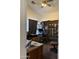Office with a desk, chair, and shelves at 14922 W Port Au Prince Ln, Surprise, AZ 85374
