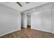Spacious living room with wood floors at 15133 W Moreland St, Goodyear, AZ 85338