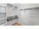 Bright walk-in closet features ample shelving and rods for efficient organization at 15133 W Moreland St, Goodyear, AZ 85338