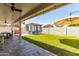 Charming backyard featuring a covered patio, well-maintained lawn, gazebo, and ample space for relaxation and entertainment at 17606 N 2Nd Ave, Phoenix, AZ 85023