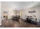 Spacious dining room with modern chandelier, wood floors, and plenty of natural light at 17606 N 2Nd Ave, Phoenix, AZ 85023